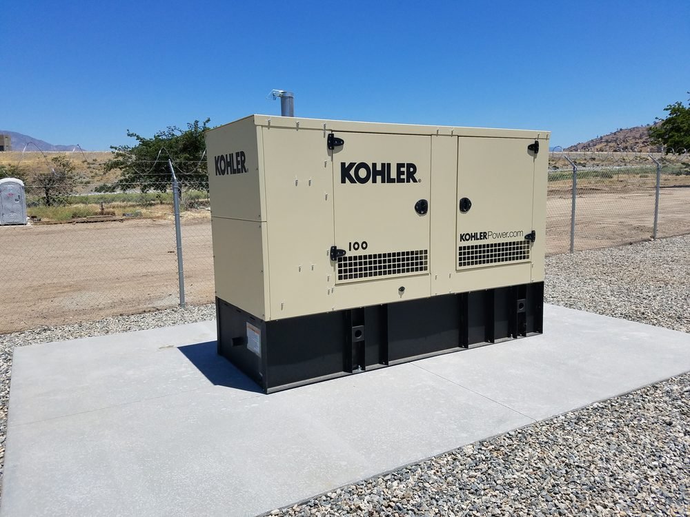 Kohler 100 kW standby generator set on a new concrete pad